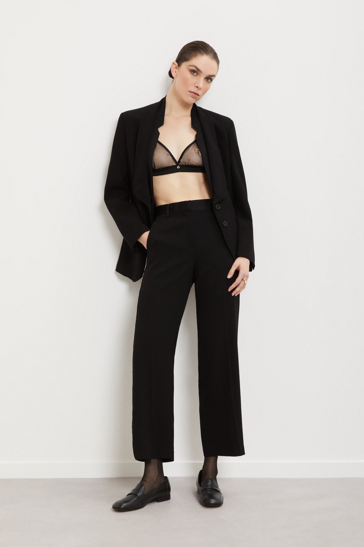 Palazzo trousers with hand-embroidered side stripes Palazzo trousers with hand-embroidered side stripes