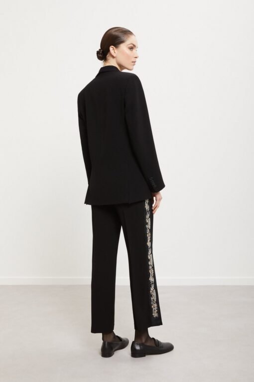 Palazzo trousers with hand-embroidered side stripes