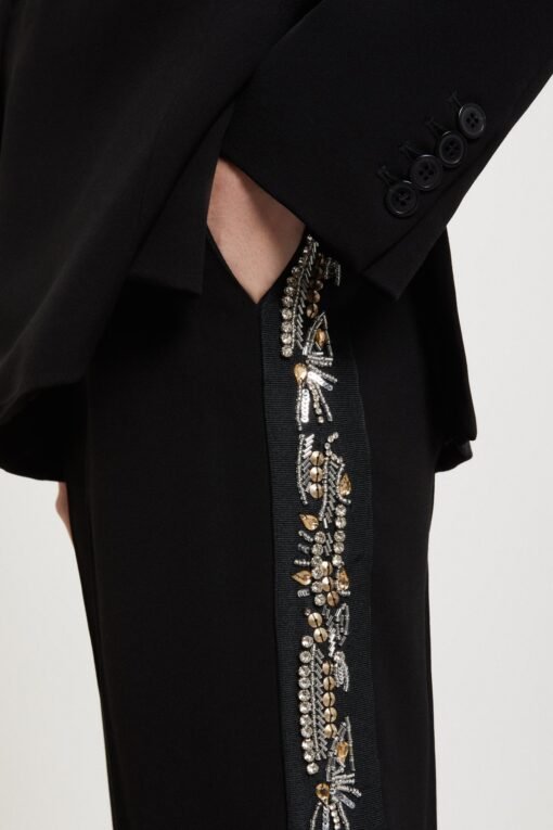 Palazzo trousers with hand-embroidered side stripes
