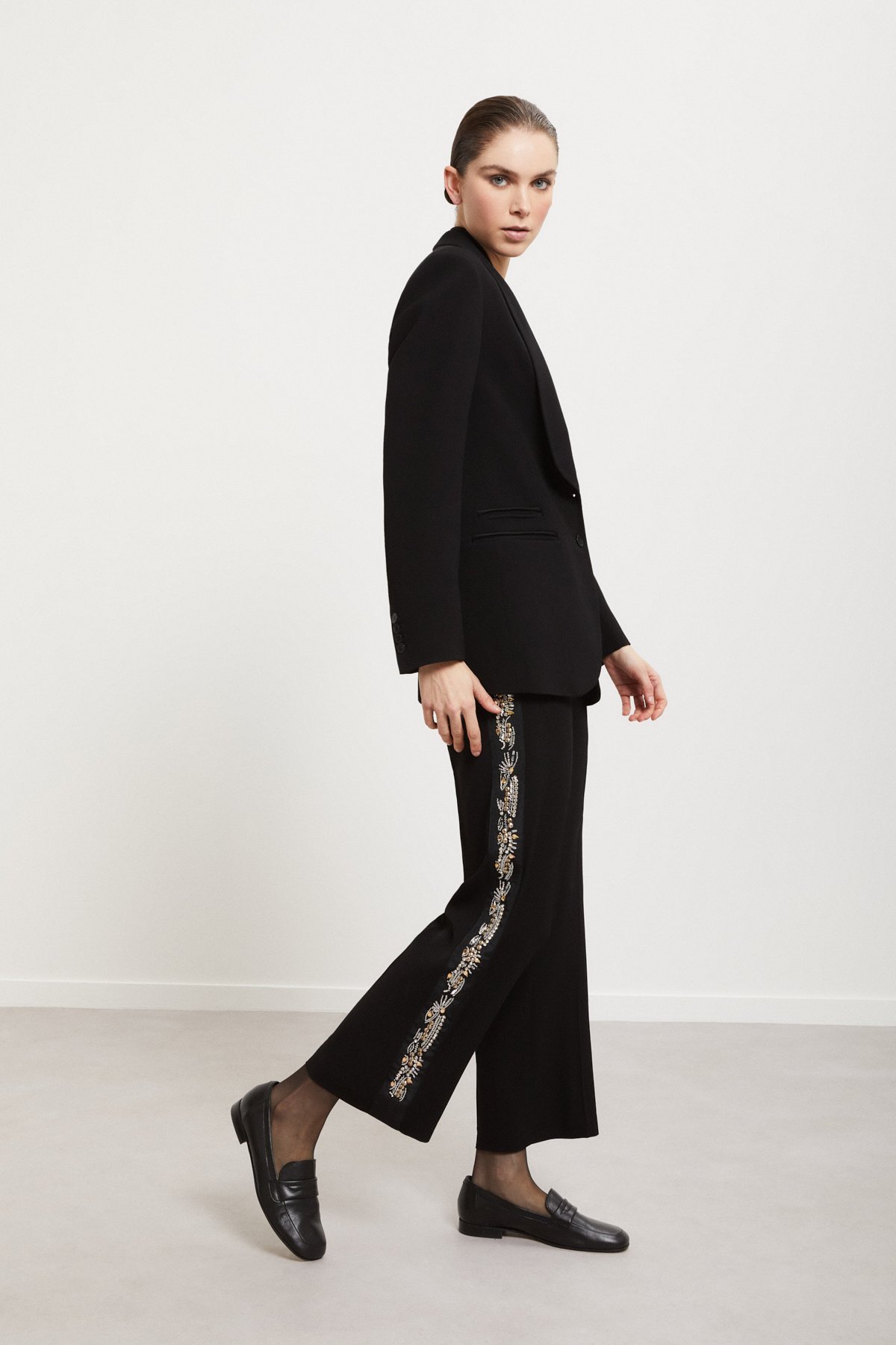 Palazzo trousers with hand-embroidered side stripes Palazzo trousers with hand-embroidered side stripes